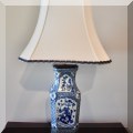 DL02. One of a pair of blue and white porcelain table lamps. 30"h 